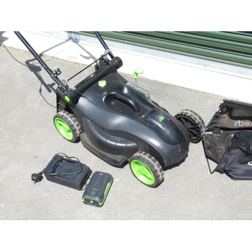 1289 - Gtech electric lawn mower with battery , charger and grass collection box