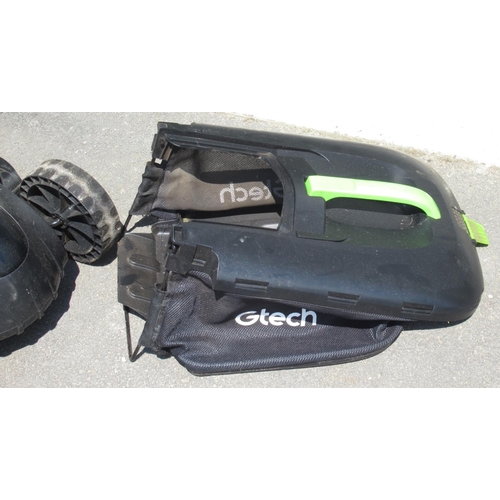 1289 - Gtech electric lawn mower with battery , charger and grass collection box