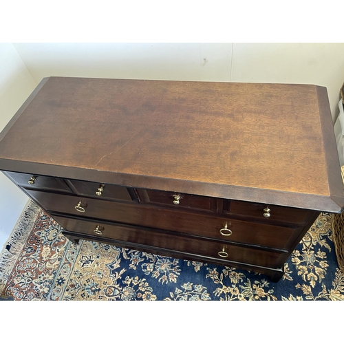 595 - Stag Minstrel low chest, fitted with four short over two long drawers, H72cm W107cm D46cm