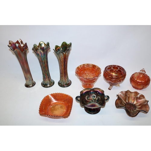 804 - Various iridescent marigold and amethyst carnival glass items, incl. a Dugan 'Question Marks' footed... 