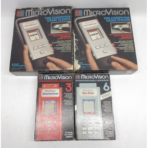 1053 - Two MicroVision computer game systems with five cartridges incl, sea duel, shooting star, spaceblitz... 