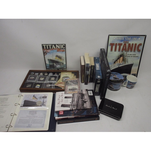 1064 - Collection of Titanic memorabilia incl. display case with fifteen enamel badges, books written by su... 