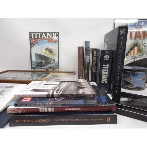 1064 - Collection of Titanic memorabilia incl. display case with fifteen enamel badges, books written by su... 