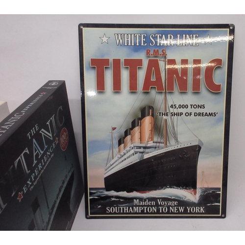 1064 - Collection of Titanic memorabilia incl. display case with fifteen enamel badges, books written by su... 