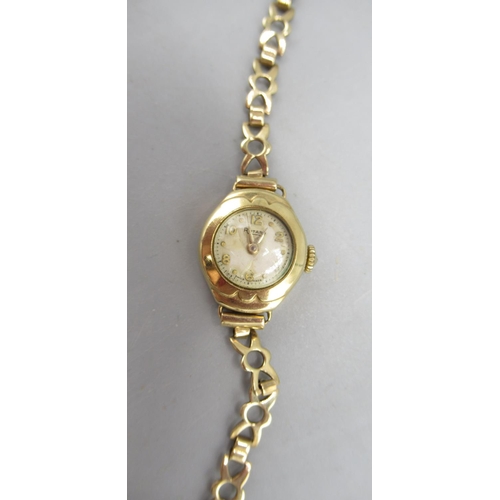 41 - 1960's ladies Rotary 9ct Rotary wristwatch on matching 9ct gold bracelet, signed silvered dial, appl... 