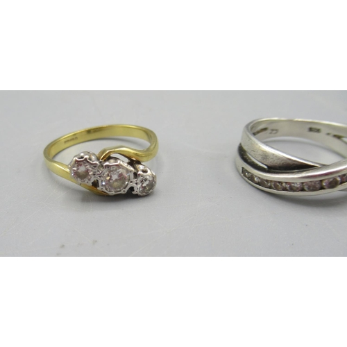 6 - 18ct yellow gold diamond crossover ring set with three diamonds, stamped 750, size M1/2, 3.1g and a ... 