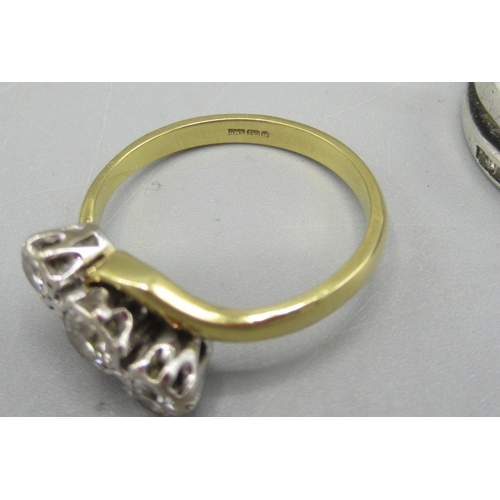 6 - 18ct yellow gold diamond crossover ring set with three diamonds, stamped 750, size M1/2, 3.1g and a ... 