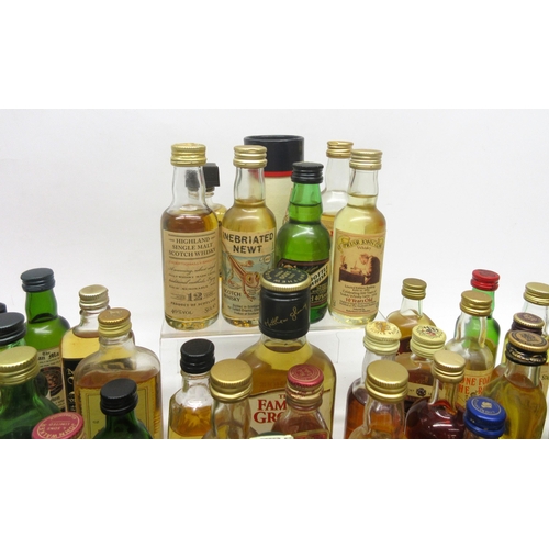 388 - Large assorted collection of whisky and other miniatures, some evaporation to bottles, to inc. Johnn... 