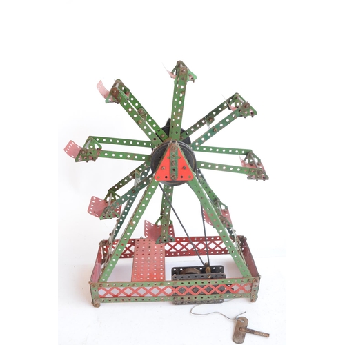 291 - Two vintage built up Meccano sets to include Ferris Wheel (in good working order, H45cm) and helicop... 