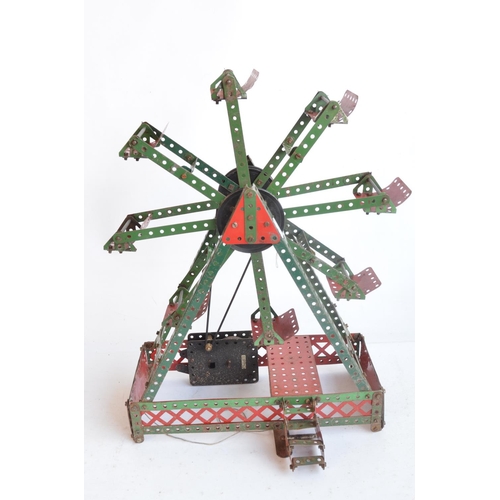 291 - Two vintage built up Meccano sets to include Ferris Wheel (in good working order, H45cm) and helicop... 