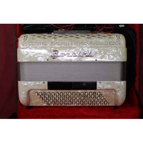 854 - Early 1970's Borsini piano accordion in cream marbleized acrylic case, simulated black and white mot... 