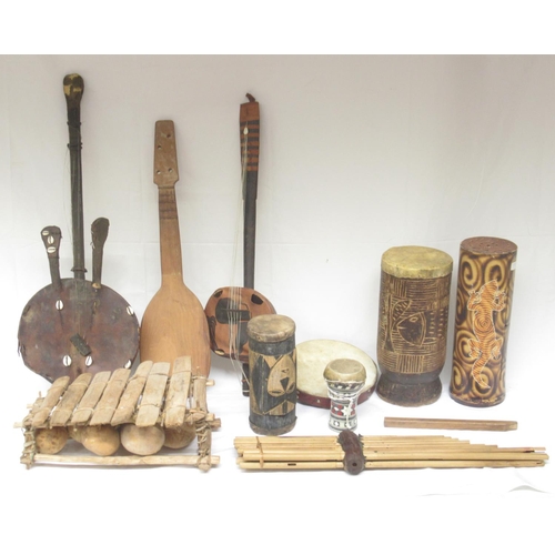 414 - Mixed collection of Tribal/Indigenous musical instruments to inc. Xylophones, string instruments, wi... 