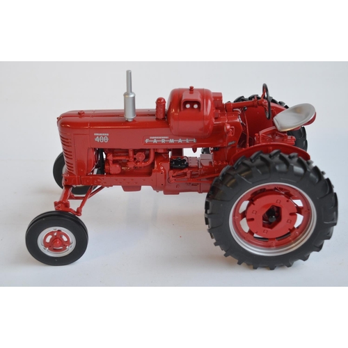 371 - Three boxed 1/16 scale diecast tractor models to include Universal Hobbies 1950 Renault R3042 (model... 