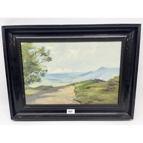 344 - Lewis Creighton (British 1918-1996); Cliff top Moorland landscape, oil on board, signed, 30cm x 44cm