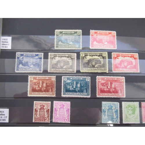 667 - Collection of C19th/20th International stamps in 4 albums from Monaco, Denmark, Norway, Sweden, Finl... 