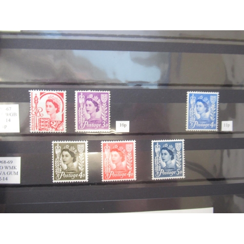 673 - Collection of predominantly C20th British stamps with some International, in 6 albums, 2 being Guern... 