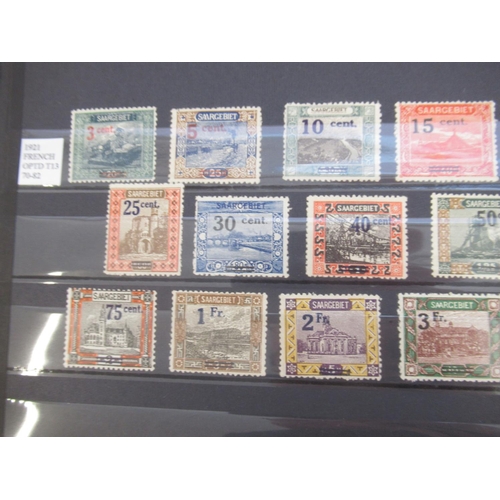 677 - Collection of C19th/20th International Stamps from Austria, Switzerland, Hungary and SAAR in 4 album... 