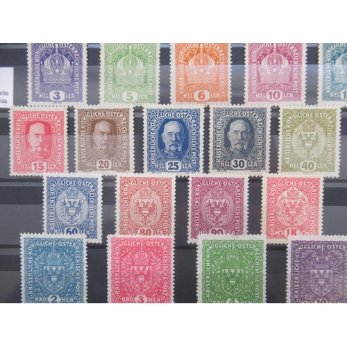 677 - Collection of C19th/20th International Stamps from Austria, Switzerland, Hungary and SAAR in 4 album... 