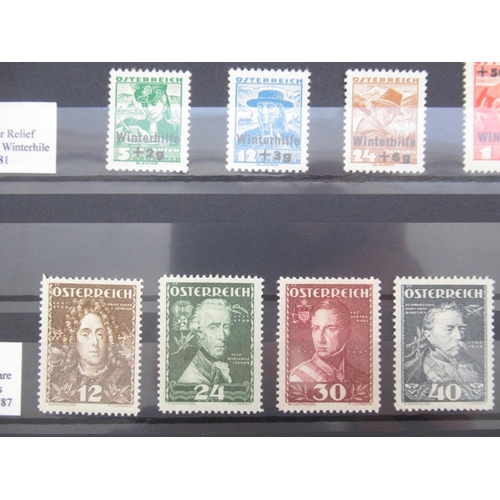 677 - Collection of C19th/20th International Stamps from Austria, Switzerland, Hungary and SAAR in 4 album... 