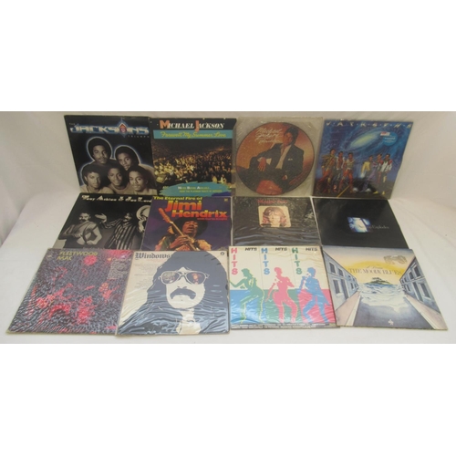 868 - Mixed collection of LPs to inc. Genesis, Mike Oldfield, ELO, Lynyrd Skynryd, Jeff Beck, Jethro Tull,... 