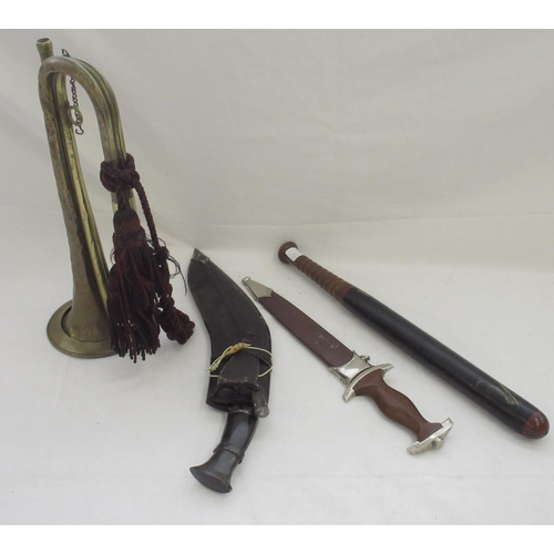 1413 - Selection of militaria, including a horn-handled Kukri, an early police truncheon, a bugle etc.