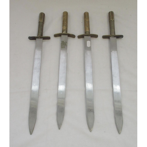 1414 - Four custom-made brass handled prop bayonets with no edge. Blade L33cm. Overall L44cm