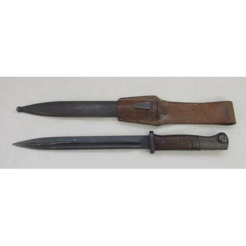 1415 - German K98 bayonet with original scabbard and leather frog. Blade L25cm. Overall L39cm