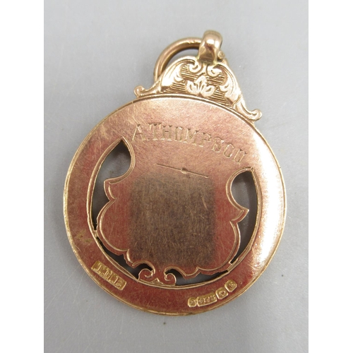 36 - Early 20th century 9ct yellow gold fob set with central enamel panel depicting a pigeon, the front e... 