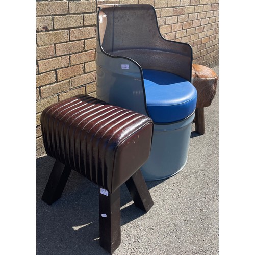 1199 - Shane Lynch collection - Industrial tub chair, leather foot stool and a cow hide foot stool