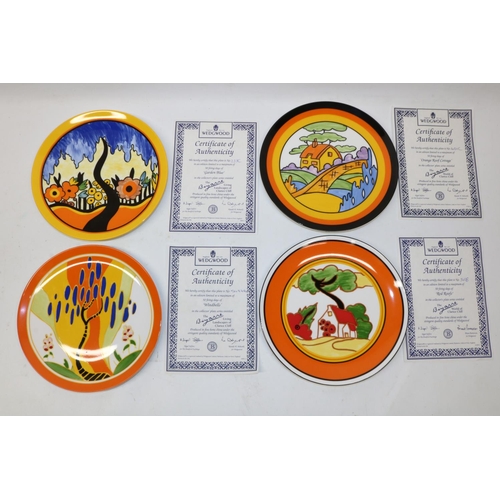 715 - Four Wedgwood Clarice Cliff Bradford Exchange wall plates, patterns comprising 'Red Roofs', 'Windbel... 