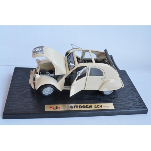 355 - Two 1/18 scale diecast special edition 1952 Citroen 2CV models from Maisto (both models in at least ... 