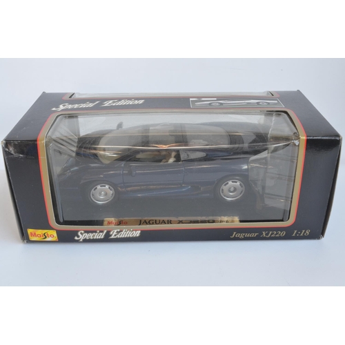 358 - Collection of large scale diecast model cars to include a Maisto 1/12 Jaguar XJ220 and 5x 1/18 scale... 