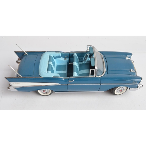 363 - Four boxed 1/24th scale diecast vehicles to include a Franklin Mint 1953 Cadillac Eldorado (model wi... 