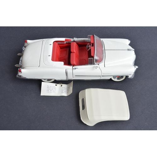 363 - Four boxed 1/24th scale diecast vehicles to include a Franklin Mint 1953 Cadillac Eldorado (model wi... 