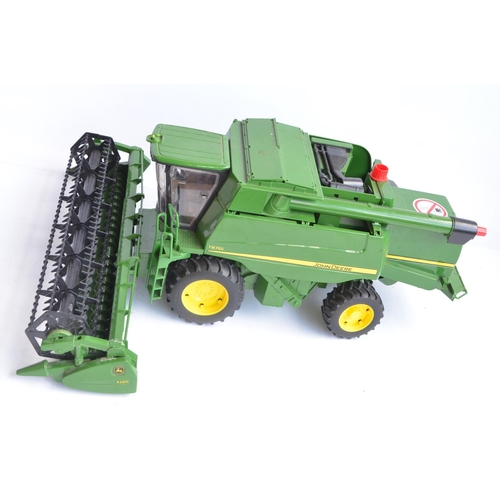 376 - Collection of 1/16 mostly farming related models from Bruder and Ertl to include Bruder John Deere T... 