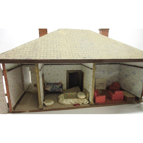 277 - 1930s bungalow dolls house, opens from front and back, furnished