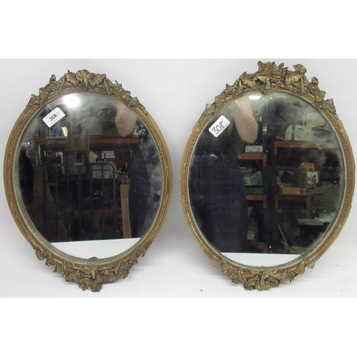 308 - Pair of late 19th century gilt gesso framed oval mirrors, H44cm (2)