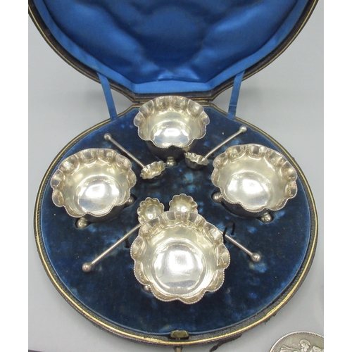 76 - Victorian silver set of four salts each on three ball feet and fluted rims in fitted case, by Goldsm... 