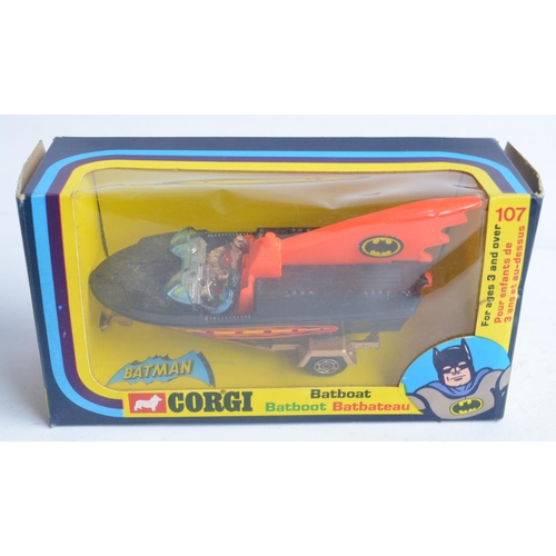 379 - Boxed vintage C1970s Corgi Batmobile and Batboat, both in good condition, some paint chipping etc., ... 