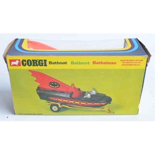 379 - Boxed vintage C1970s Corgi Batmobile and Batboat, both in good condition, some paint chipping etc., ... 