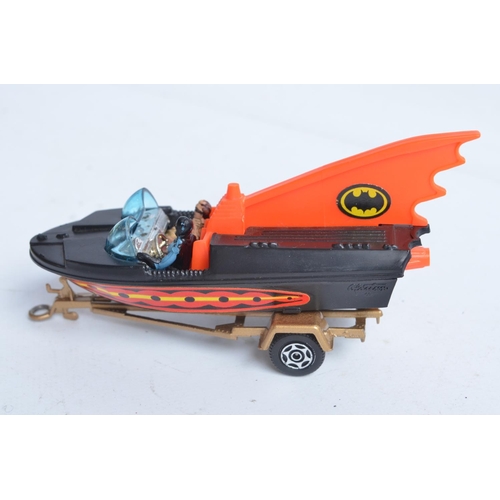 379 - Boxed vintage C1970s Corgi Batmobile and Batboat, both in good condition, some paint chipping etc., ... 