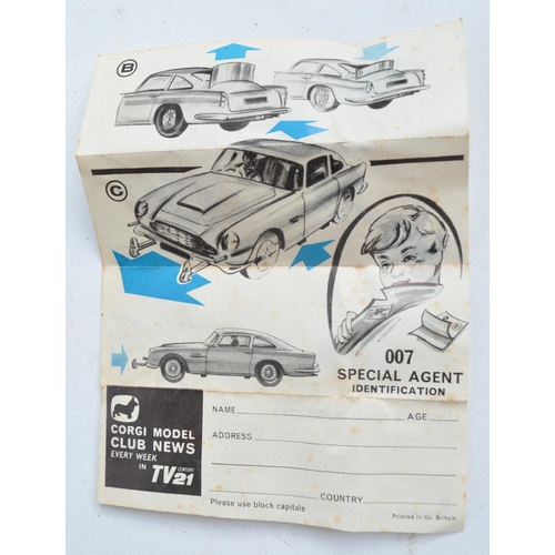 382 - Vintage boxed Corgi 261 James Bond gold coloured Aston Martin DB5, model in good overall condition, ... 