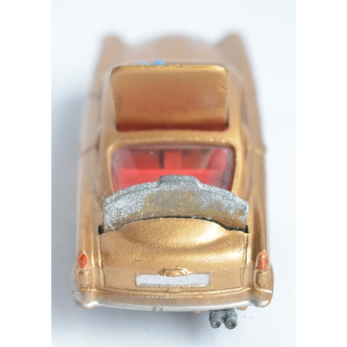 382 - Vintage boxed Corgi 261 James Bond gold coloured Aston Martin DB5, model in good overall condition, ... 