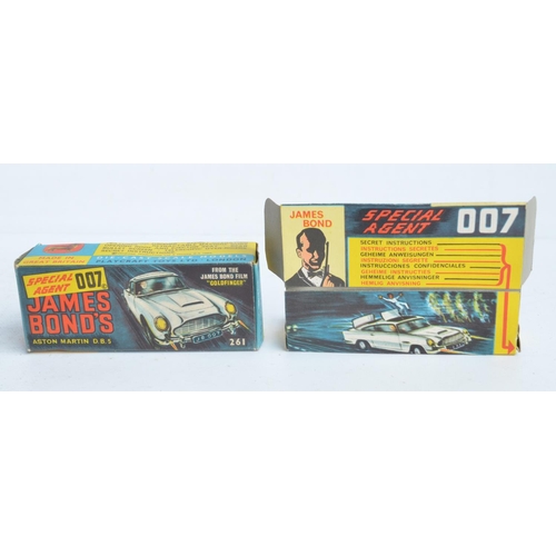 382 - Vintage boxed Corgi 261 James Bond gold coloured Aston Martin DB5, model in good overall condition, ... 