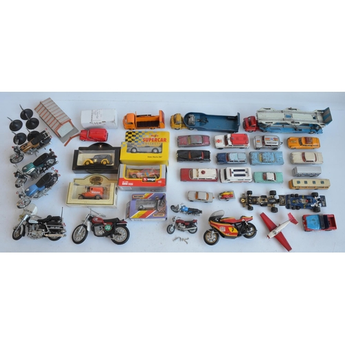 394 - Collection of mostly unboxed diecast models to include vintage examples from Corgi, Budgie, Dinky, M... 