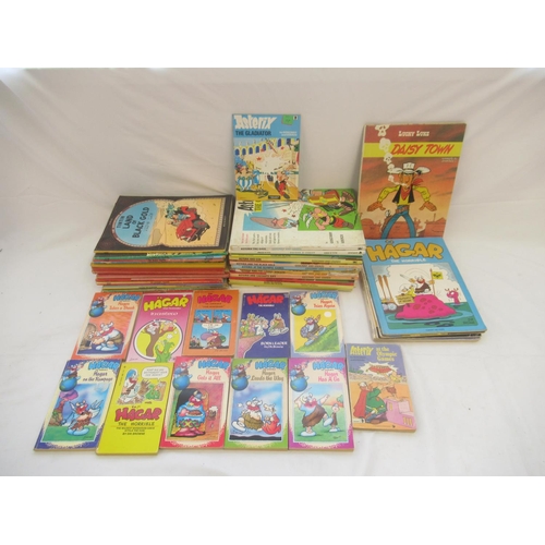 Mixed collection of Asterix, Tintin, Lucky Luke and Hagar comic books ...