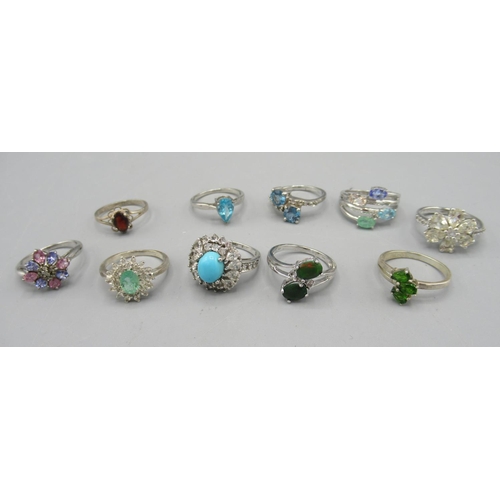 1096 - Ten silver rings set with various stones, including Zambian emerald, Swiss blue topaz, turquoise etc... 