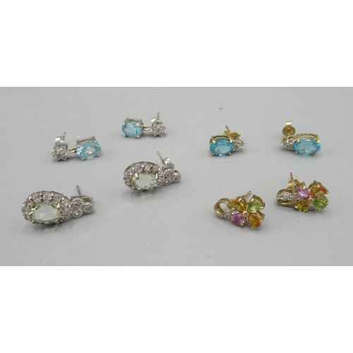 1101 - Four pairs of 9ct and 10ct yellow and white gold stud earrings set with multi coloured stones, all s... 