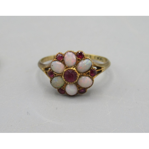 206 - 18ct gold opal and ruby cluster ring, size N, and an 18ct yellow gold ring set with diamonds and eme... 