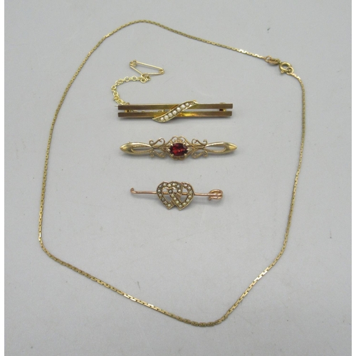 207 - 9ct gold bar brooch set with red stone, another gold bar brooch set with pearls, stamped 9ct, a yell... 